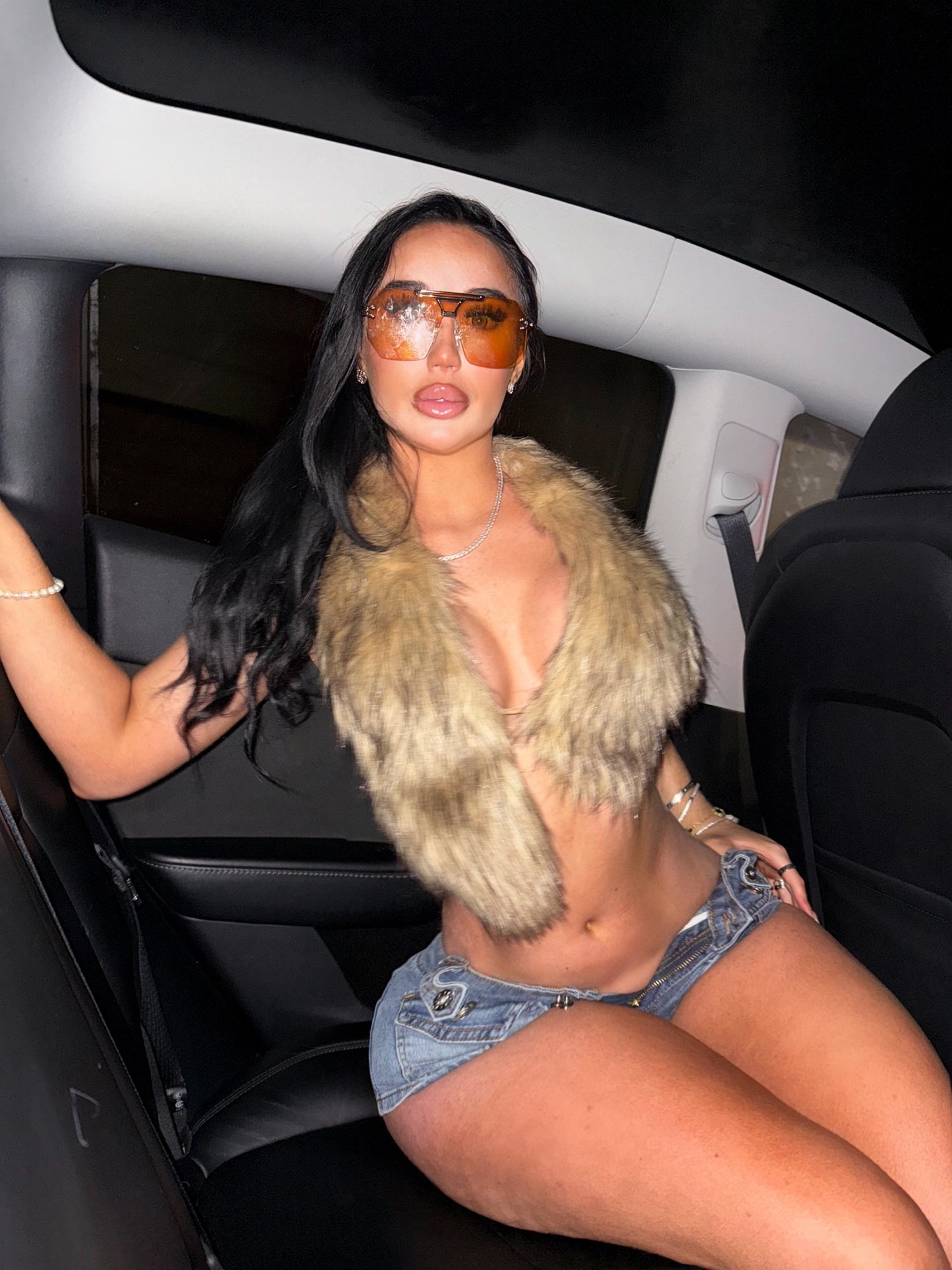 Maria backless faux fur top